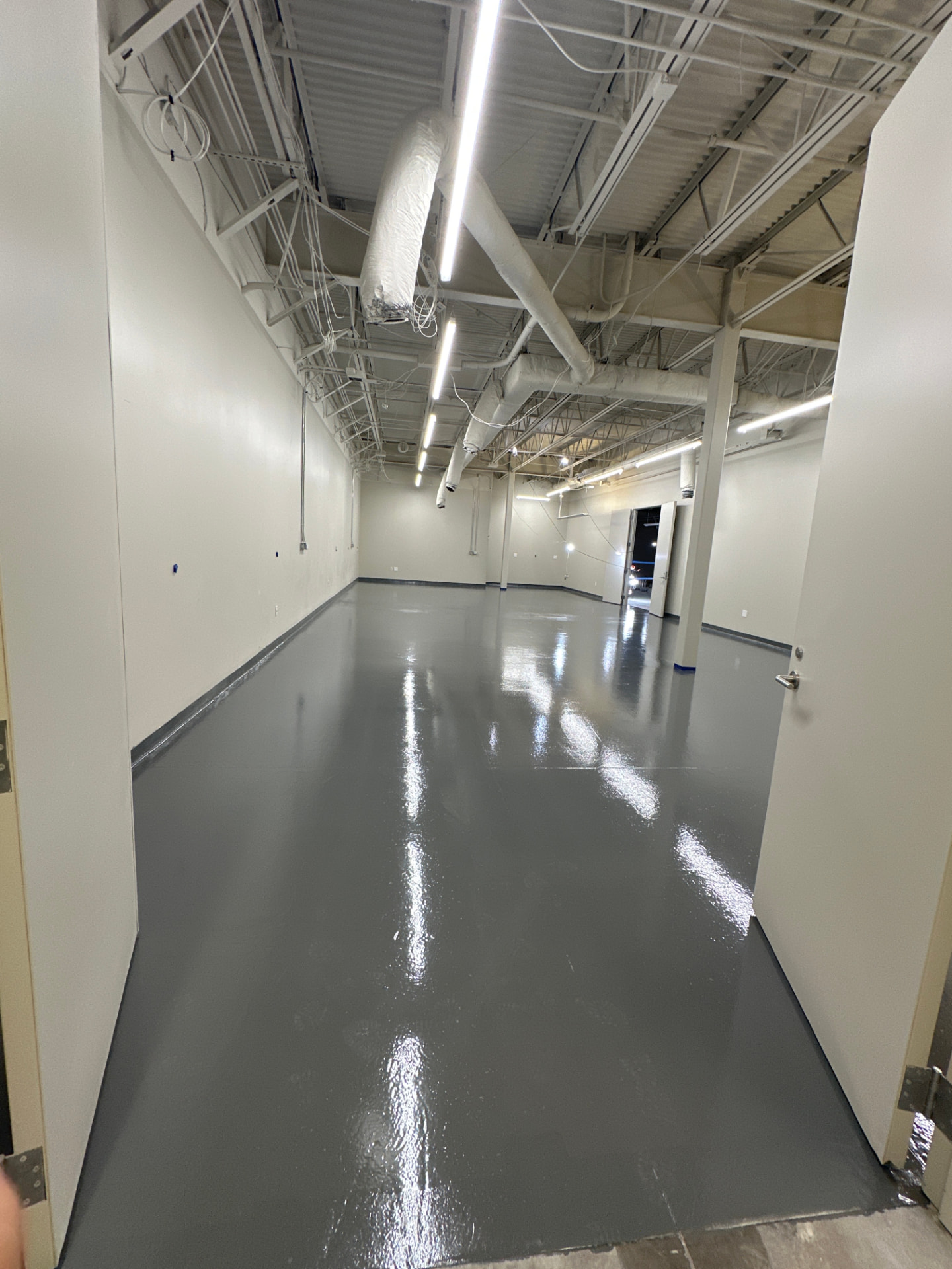 Industrial facility floor during Maydus improvement work